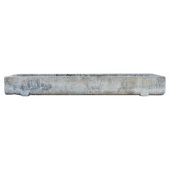 Antiguo abrevadero francés de piedra caliza