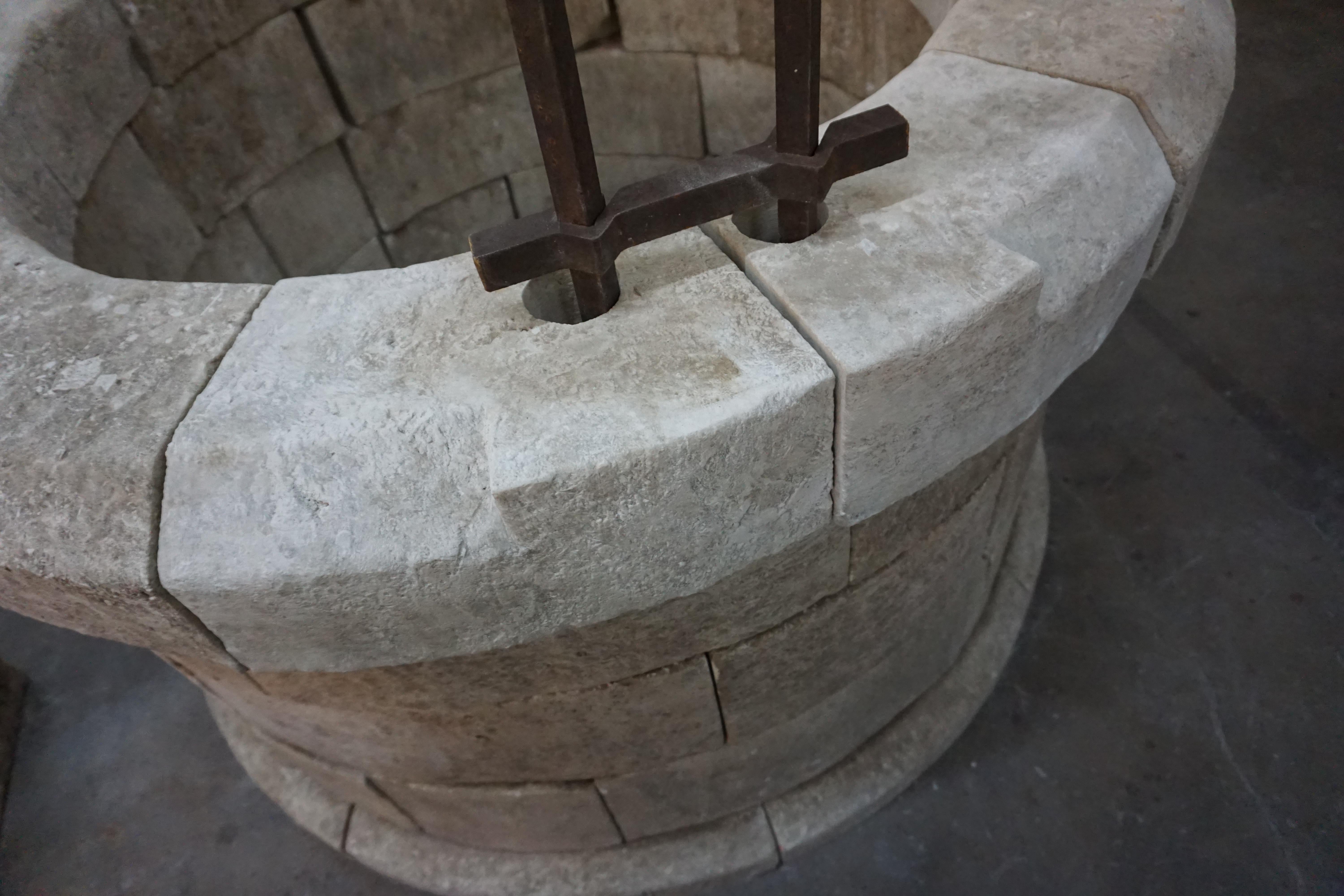 This well is made of reclaimed French limestone from the late 1800s. 

Measurements: 57'' D x 75'' H.