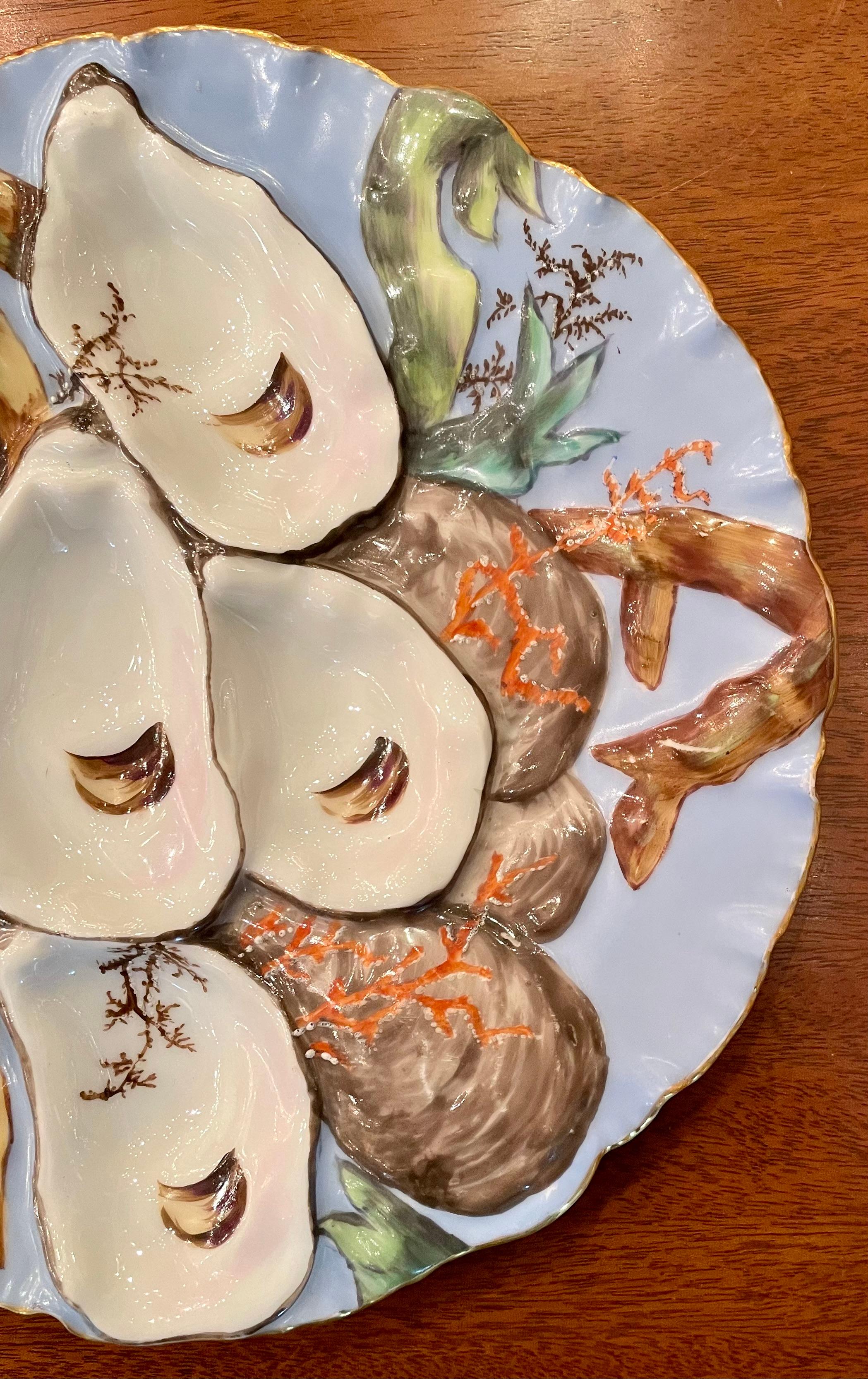 Antique French Limoges porcelain turkey pattern oyster plate, signed 