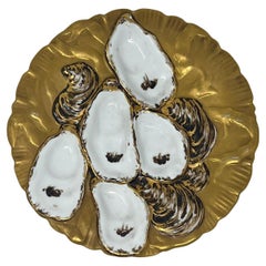 Antique French Limoges Gold Porcelain Turkey Pattern Oyster Plate, Circa 1900.