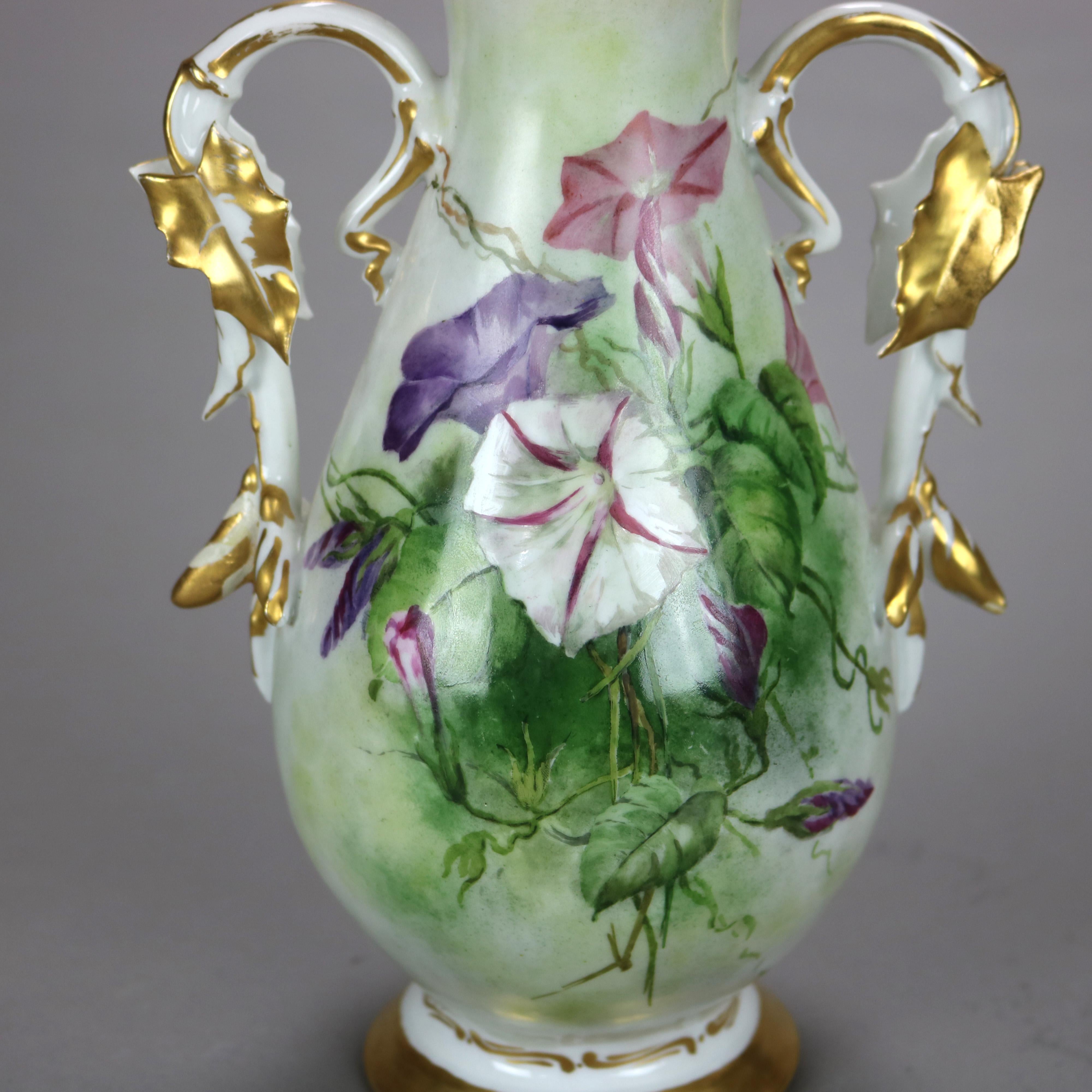 Antique French Limoges Morning Glory Floral & Gilt Hand Painted Porcelain Vase with Vine Form Manles, c1890

Misure - 10 