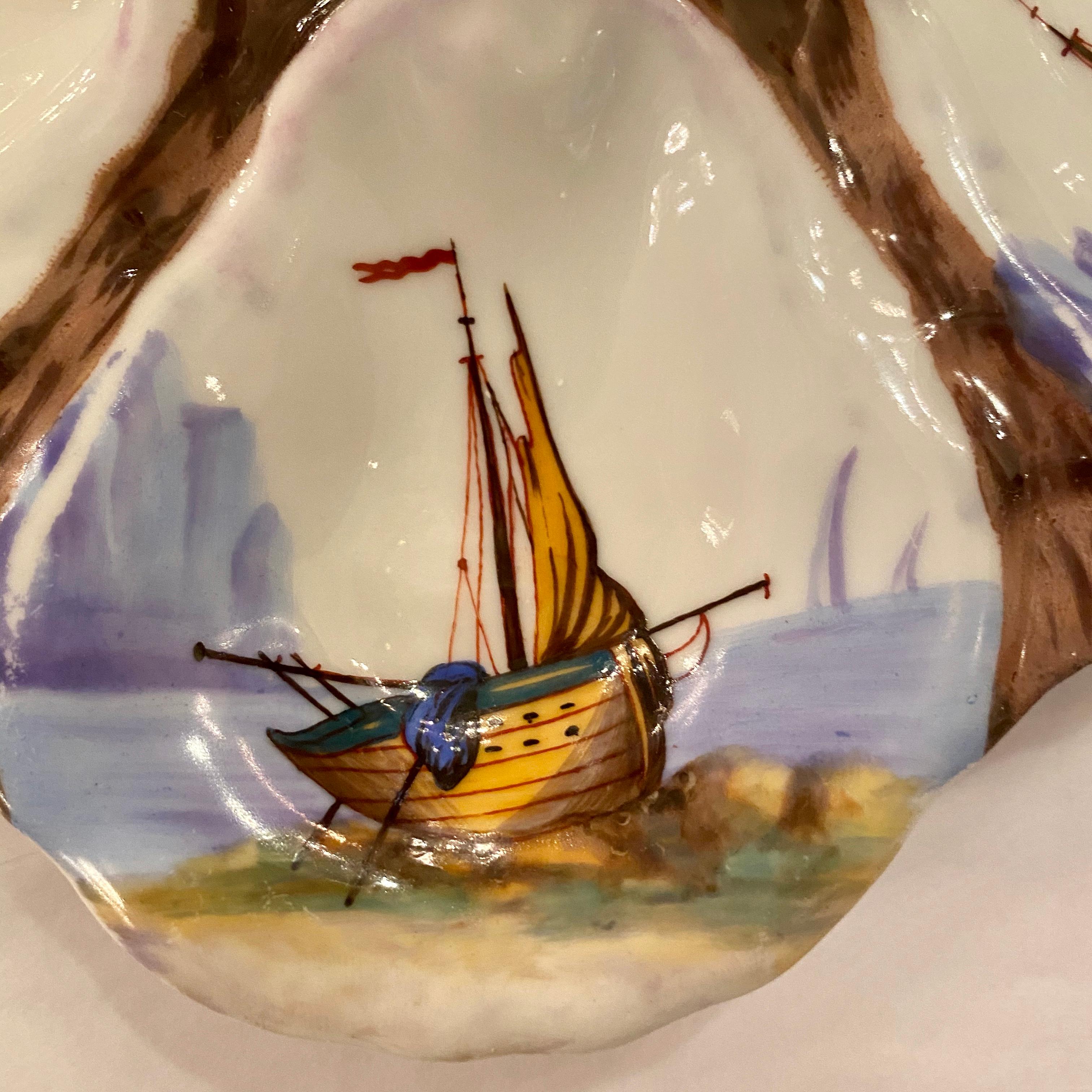 Antique French Limoges Porcelain oyster plate with hand painted sailboat scenes, circa 1880s.