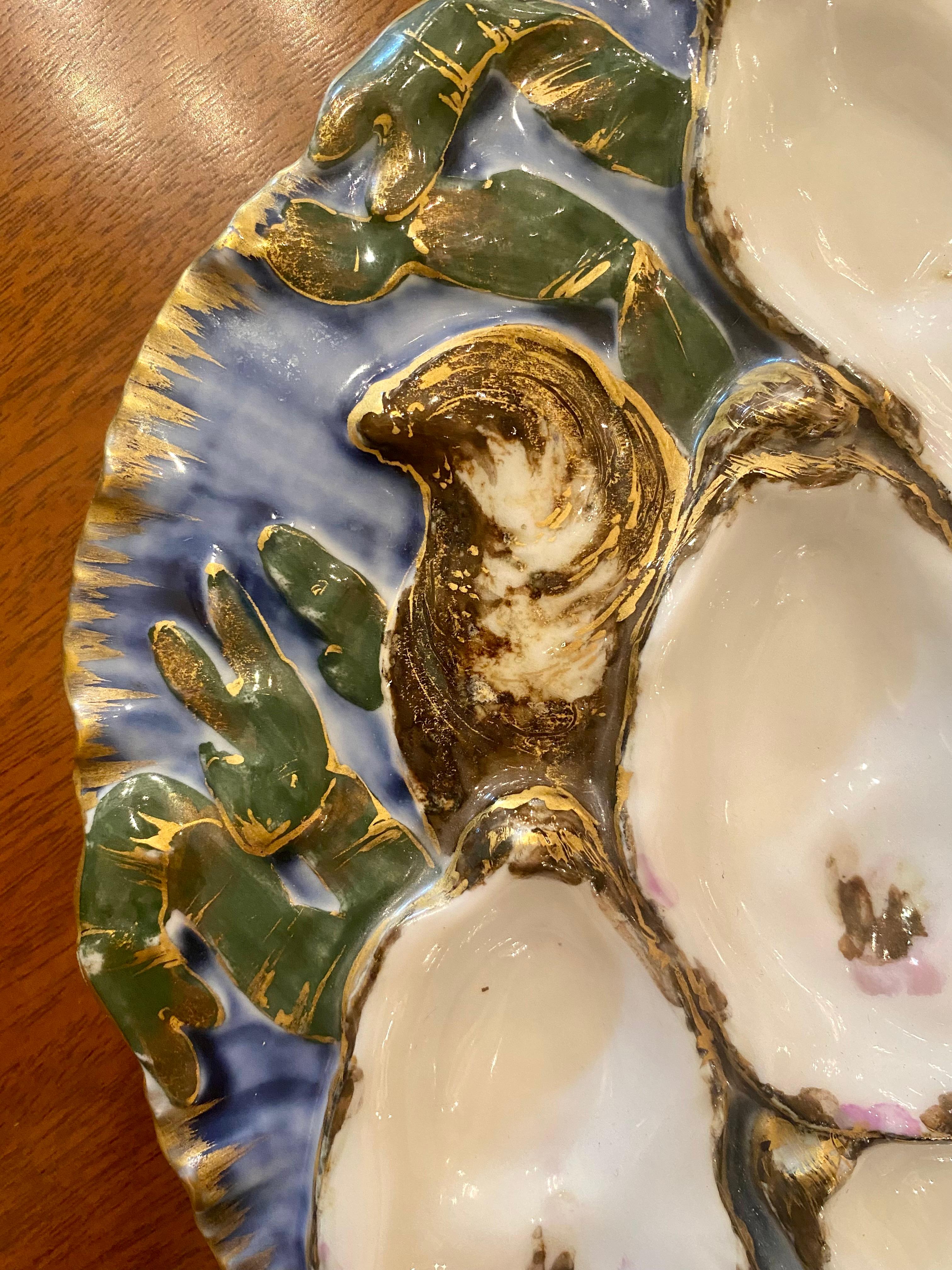 Antique French hand-painted limoges porcelain presidential oyster plate in the original Turkey pattern, Circa 1880's-1890's. 
Commissioned by the administration of American President Rutherford B. Hayes, this plate is the pinnacle of oyster plate