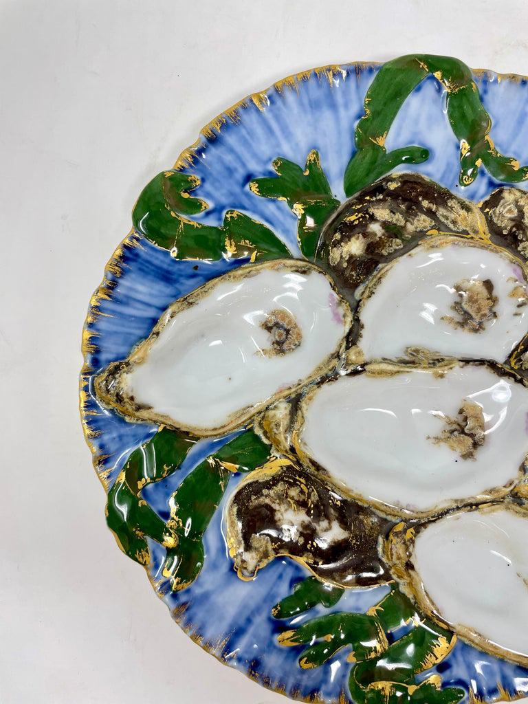 Antique French hand-painted limoges porcelain presidential oyster plate in the original Turkey pattern, Circa 1880's-1890's. Made by Haviland & Co. 
Commissioned by the administration of American President Rutherford B. Hayes, this plate is the