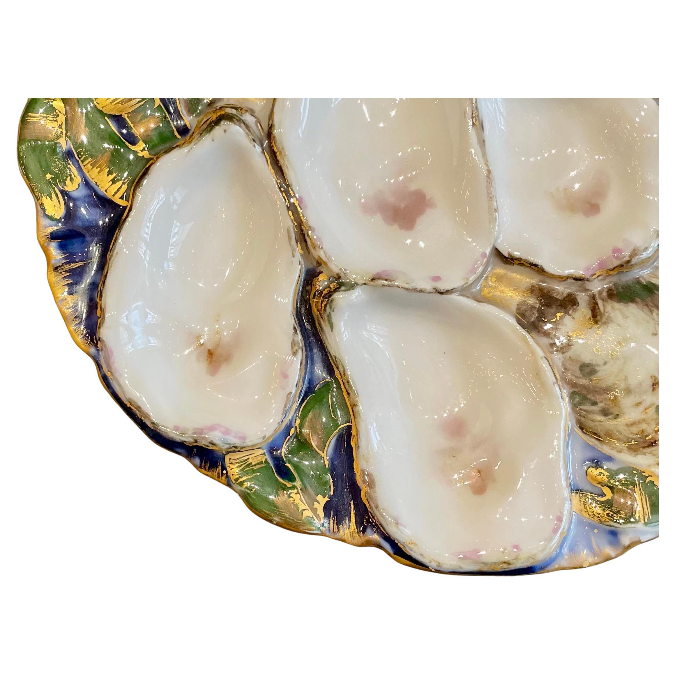 Antique French hand-painted Limoges porcelain Presidential oyster plate in the original Turkey pattern, Circa 1880's-1890's. Made by Haviland & Co.

Commissioned by the administration of American President Rutherford B. Hayes, this plate is the