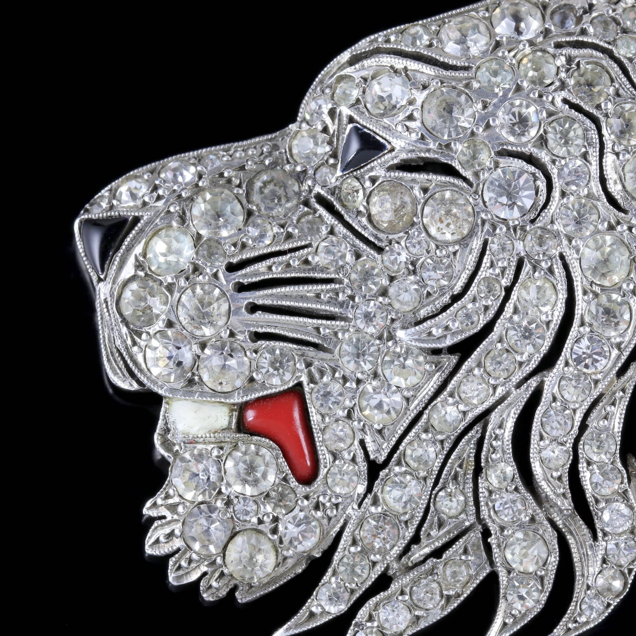 To read more please click continue reading below-

This fabulous antique French Lion’s head brooch was made during the Victorian era, Circa 1860.

The wonderful head of the lion is decorated in sparkling white Paste Stones with a wonderful red Coral