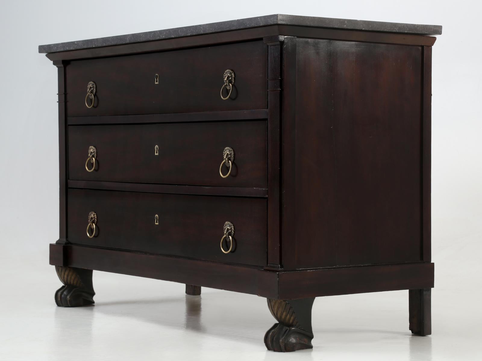 Antique Lion Paw footed French Empire style commode. Our old plank workshop completed a thorough restoration of this antique French commode from the interior to the exterior, while leaving the marble patina intact. The drawers were rebuilt so that