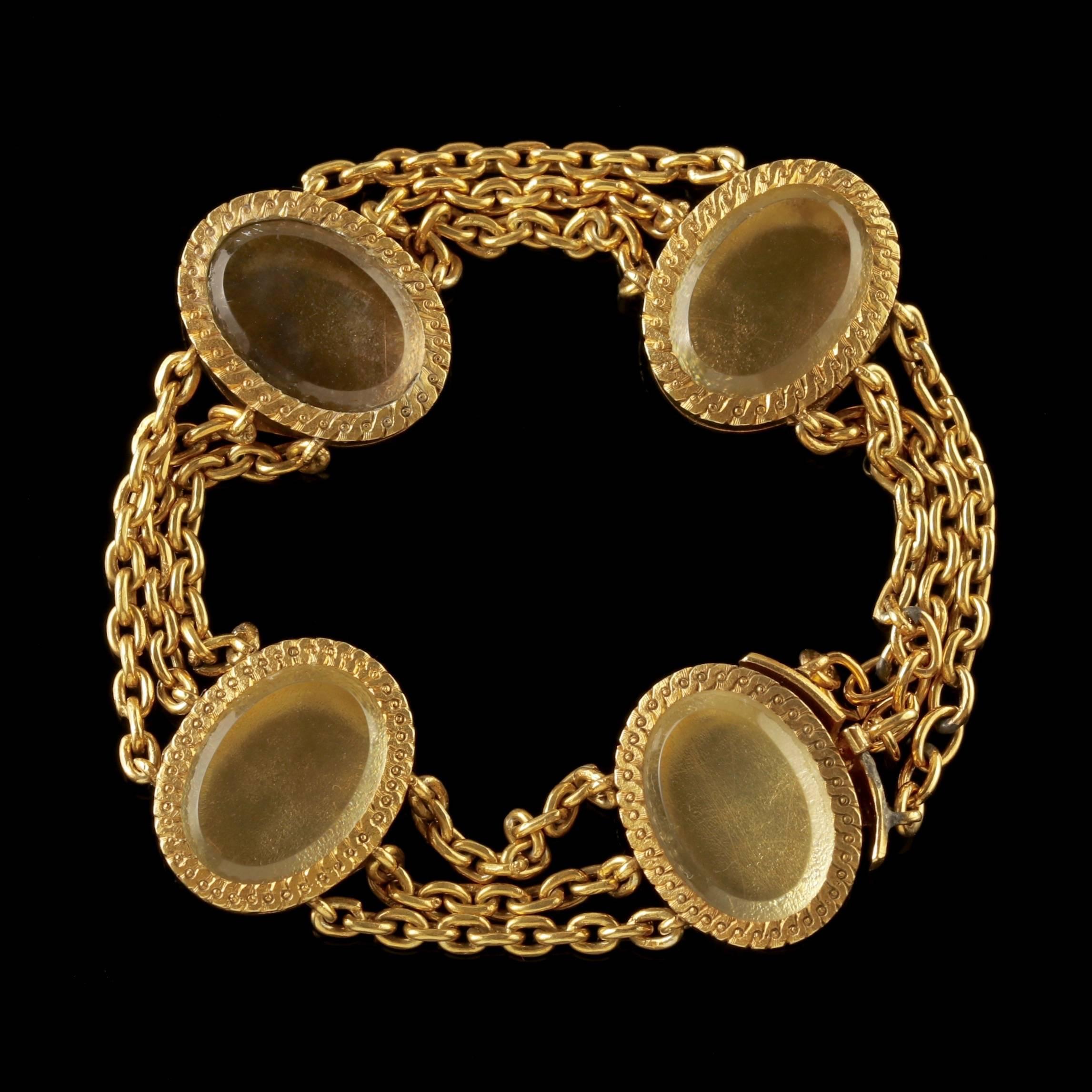 To read more please click continue reading below-

This stunning antique French Locket bracelet was made during the Victorian era, Circa 1860.

The fabulous piece is adorned with four engraved Lockets with beautiful Rock Crystal windows. 

Rock