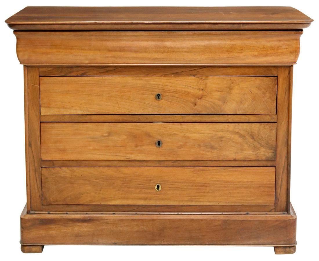 Antique French Louis Philippe period four drawer walnut commode, mid 19th c. The commode rises on bracket feet.

Dimensions
approx. 33