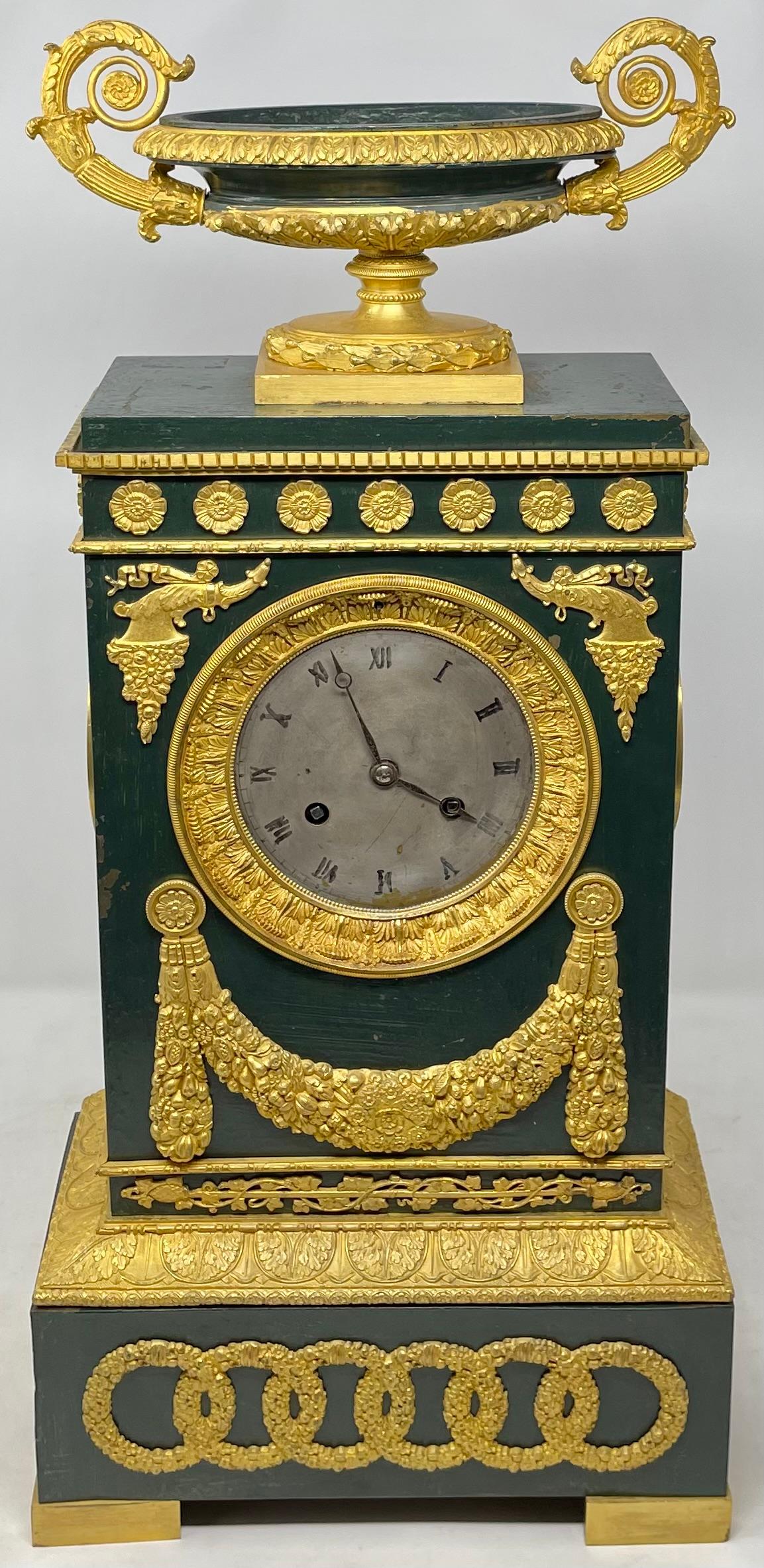 Antique French Louis Philippe Style Gold Bronze and Patinated Bronze Mantel Clock, Circa 1835-1845.
In running order.
