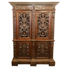 Antique French Louis Philippe Intricately Carved Walnut Armoire, Circa 1870s