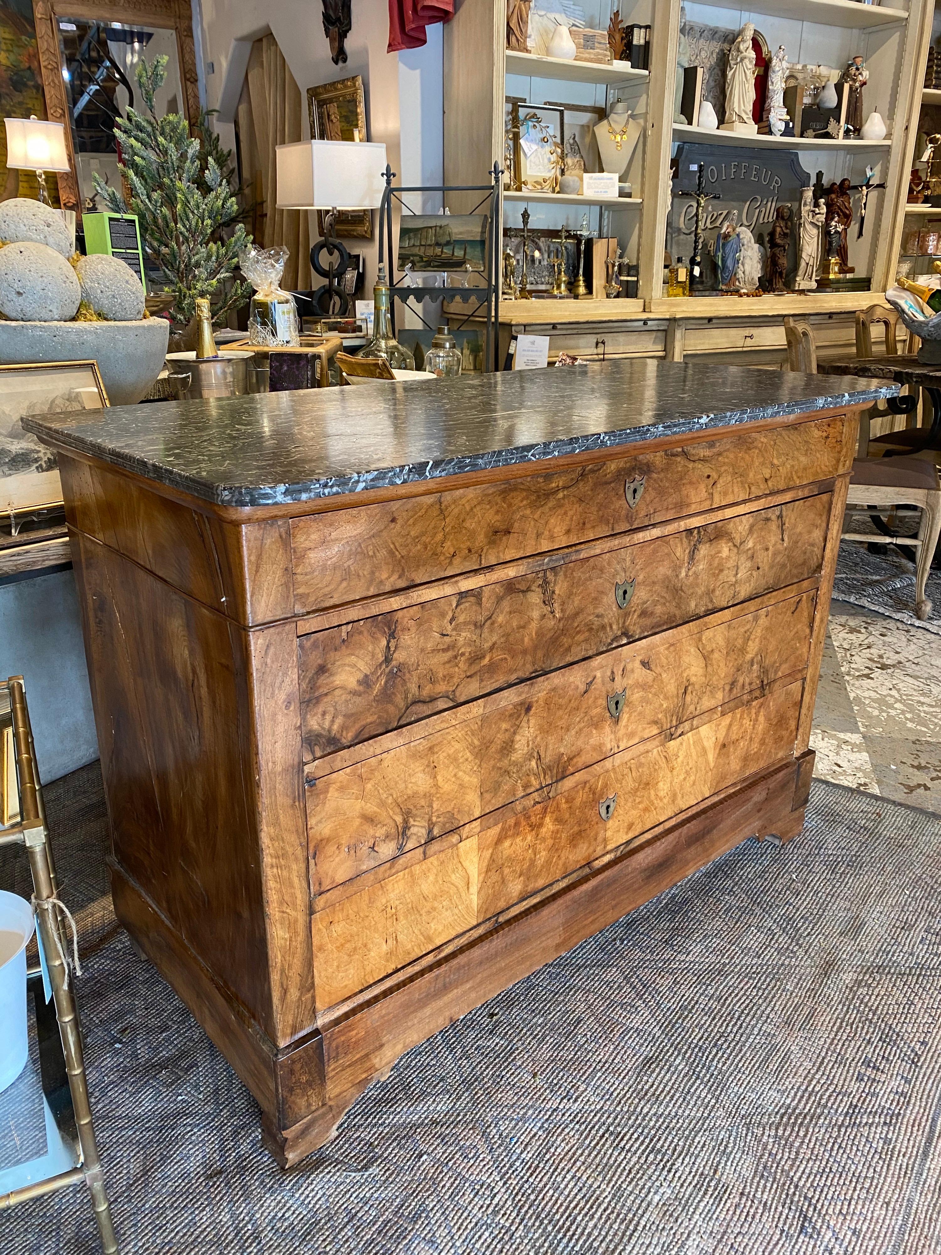 Discovered during our recent time in France, we just love the Classic look of a solid chest with this kind of character. This French commode is a Louis Phillipe style with brass keyhole hardware and included key pulls open the one of four available