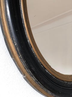 Antique French Louis Philippe Oval  Mirror – Black and Gold, Late 19th Century