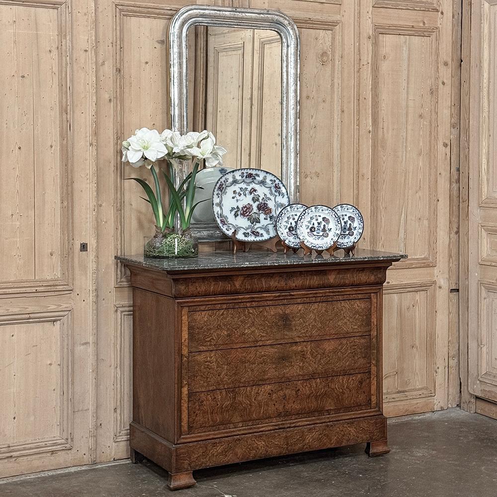 Antique French Louis Philippe Period Silvered Mirror represents the epitome of tailored elegance that was achieved during the Restoration, a short-lived resurgence of the French monarchy that briefly returned to power between the French Revolution
