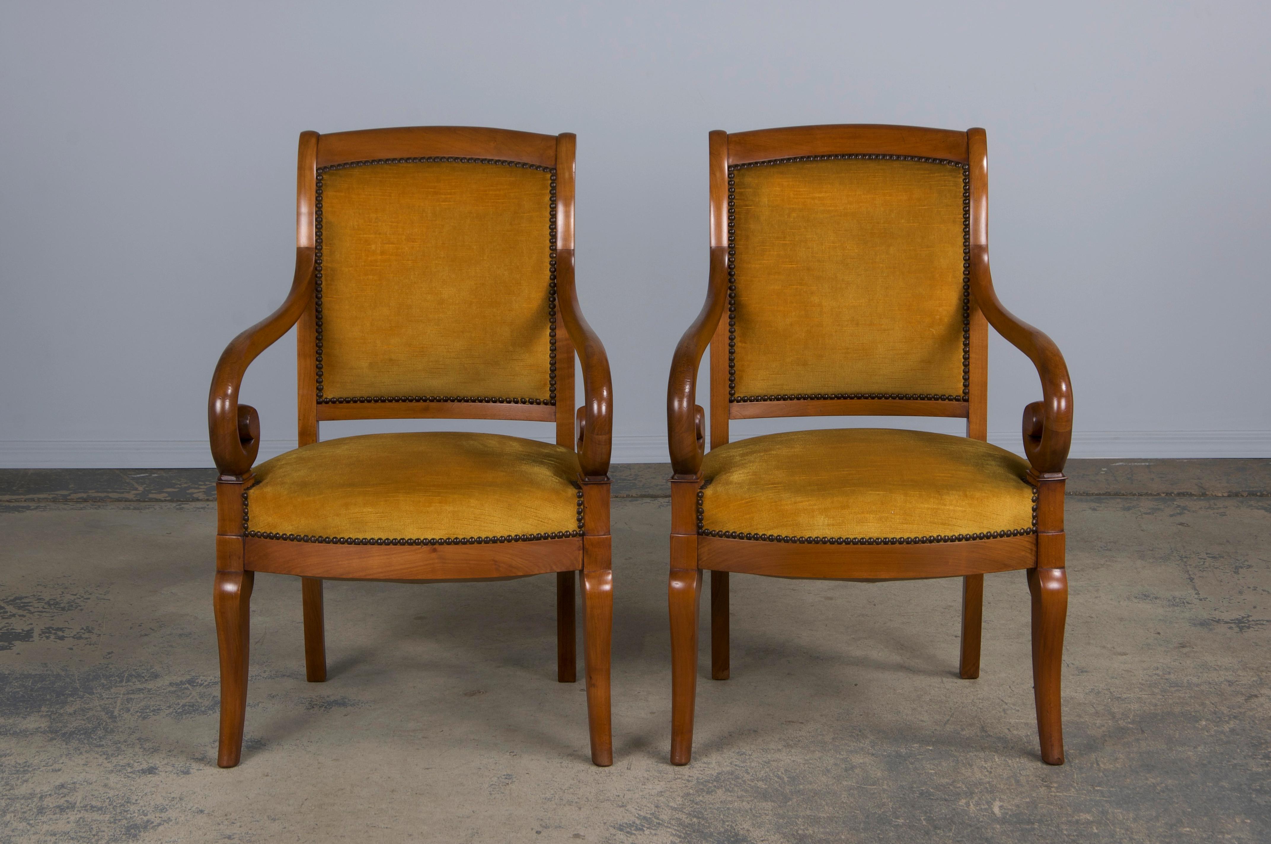 Hand-Carved Antique French Louis Philippe Style Walnut Armchairs W/ Yellow Velvet - A Pair For Sale