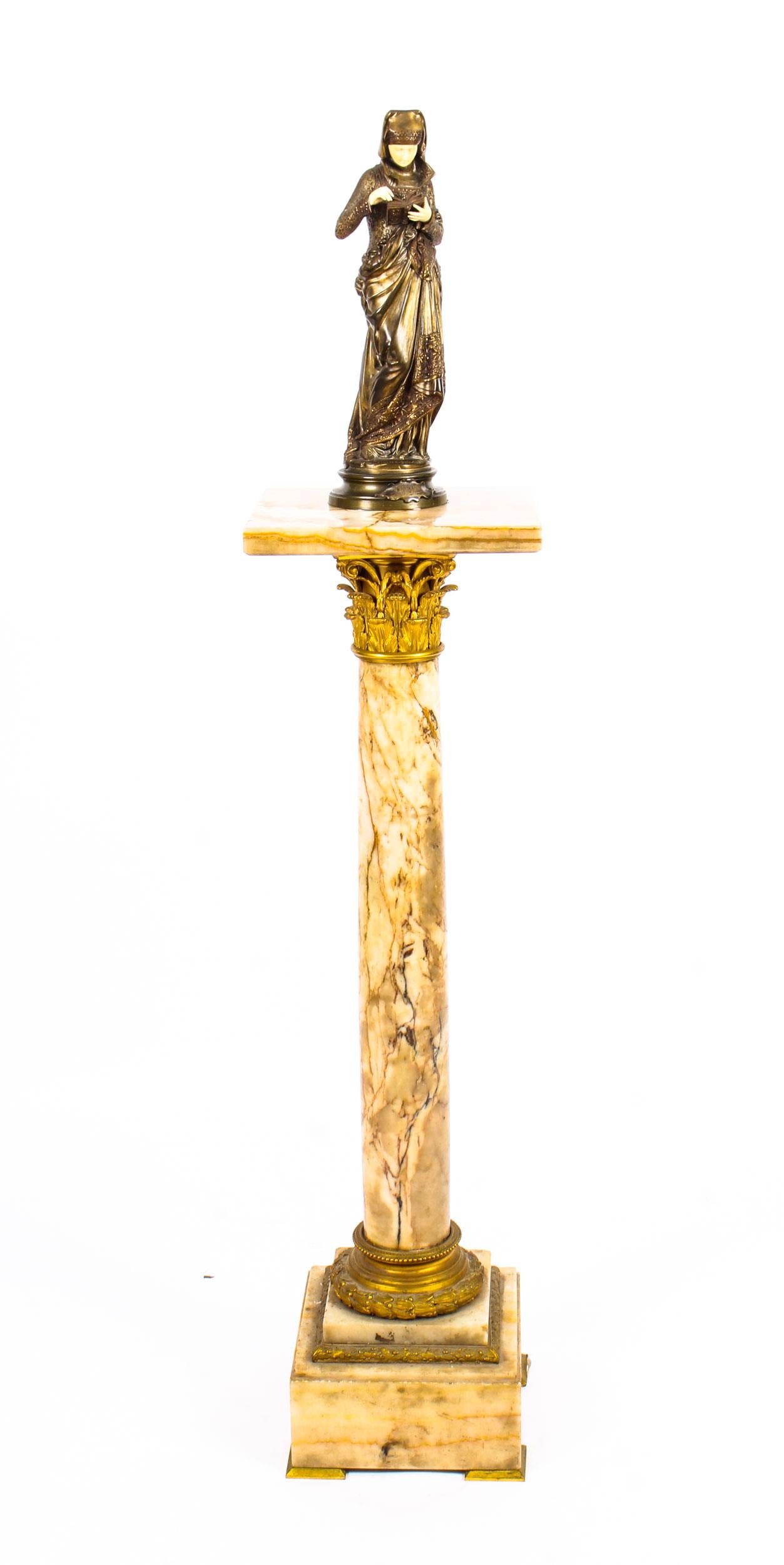 This is a splendid antique French Louis XVI Revival alabaster torchere, late 19th century in date.

This majestic torchere has a splendid square platform top which is raised on an elegantly turned column support with circular socle and a stepped