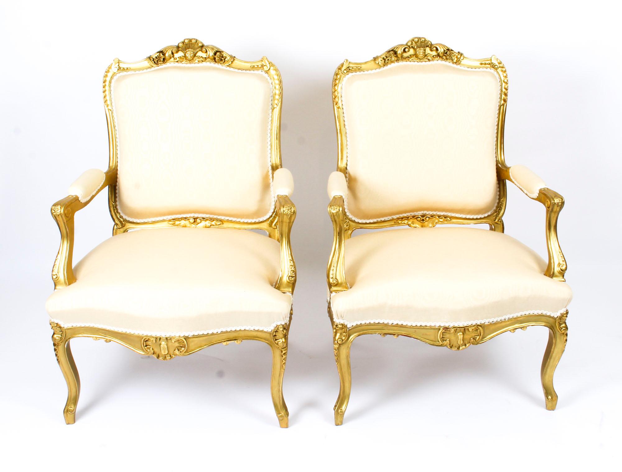This is a stunning antique French giltwood Louis Revival four piece salon suite comprising a pair of armchairs and a pair of side chairs, circa 1860 in date.
 
They have been expertly carved and gilded, decorated with acanthus, florals, scrolls and