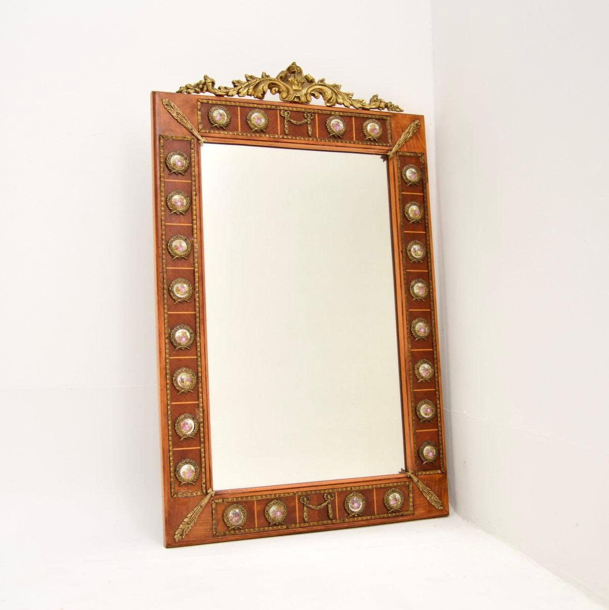 A beautiful antique French Louis style mirror, dating from around the 1930’s.

This is of superb quality, it’s a great size and has a gorgeous design. The frame is walnut, and there are high quality gilt metal ormolu mounts and wonderful hand