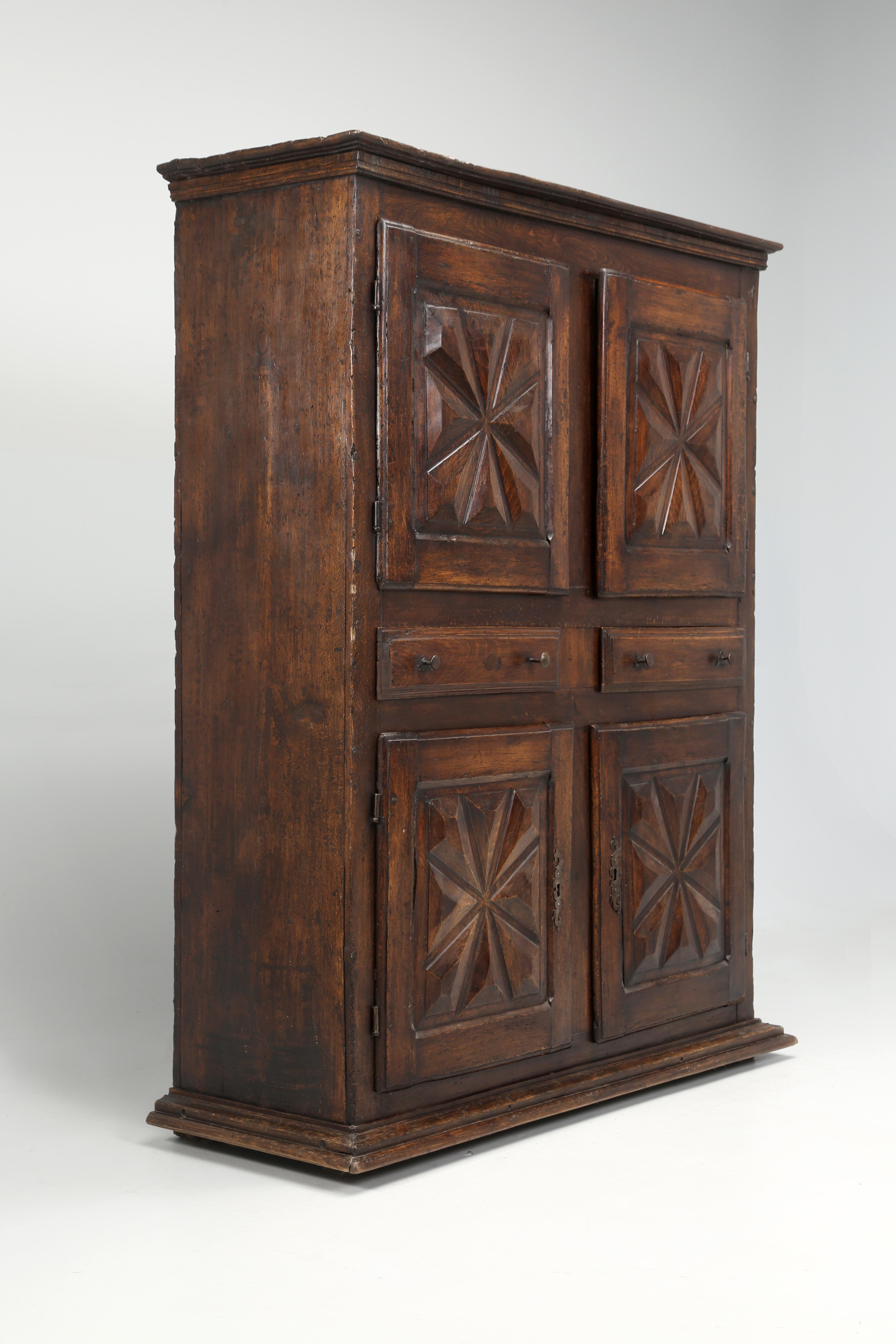 Hand-Carved Antique French Louis XIII Armoire or Cupboard from the Early 1700's