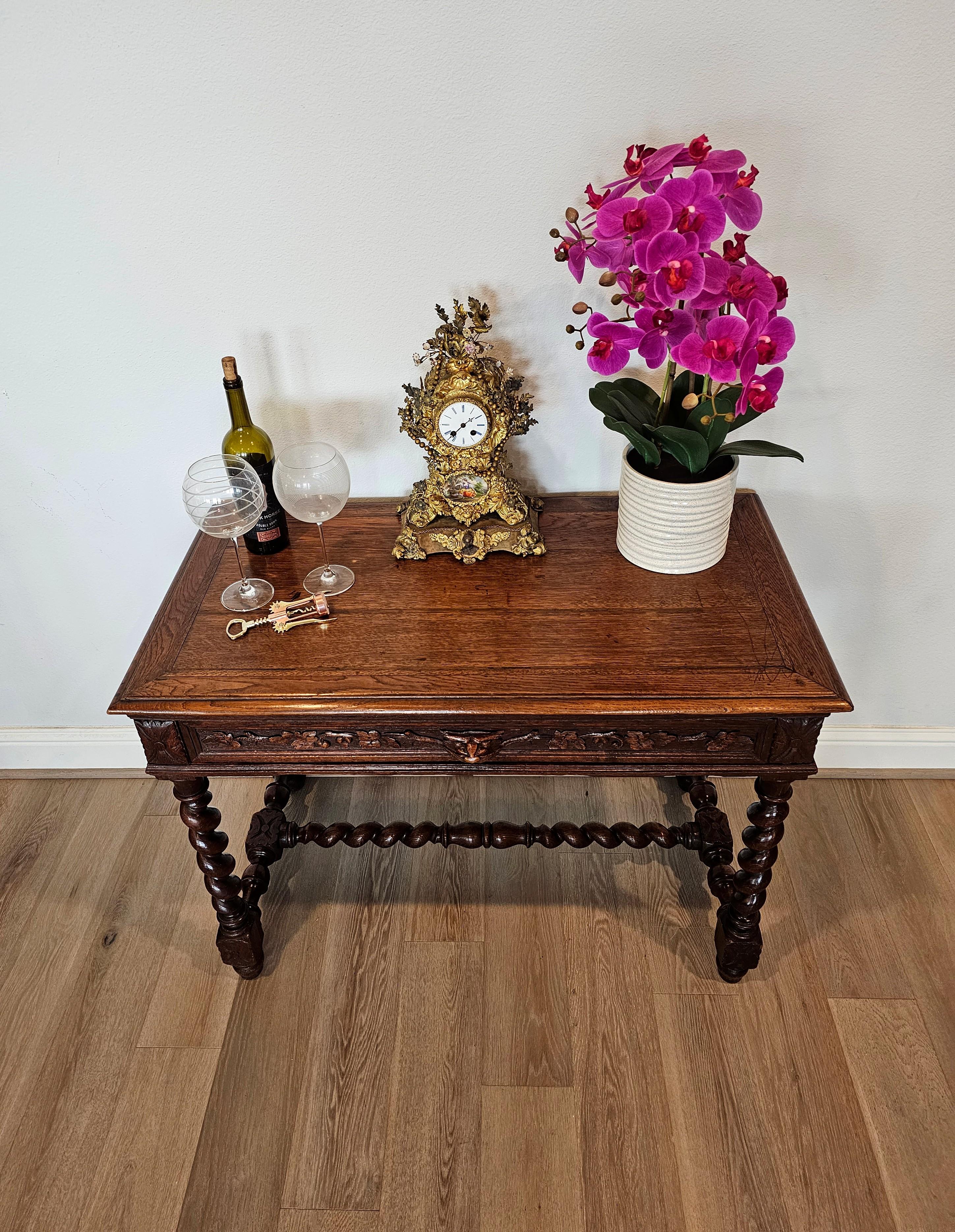 Antique French carved oak writing table with beautifully aged warm rustic patina. circa 1860

Born in France in the 19th century, hand-crafted of solid oak, exceptionally executed in Italian Renaissance influenced early 17th century King Louis