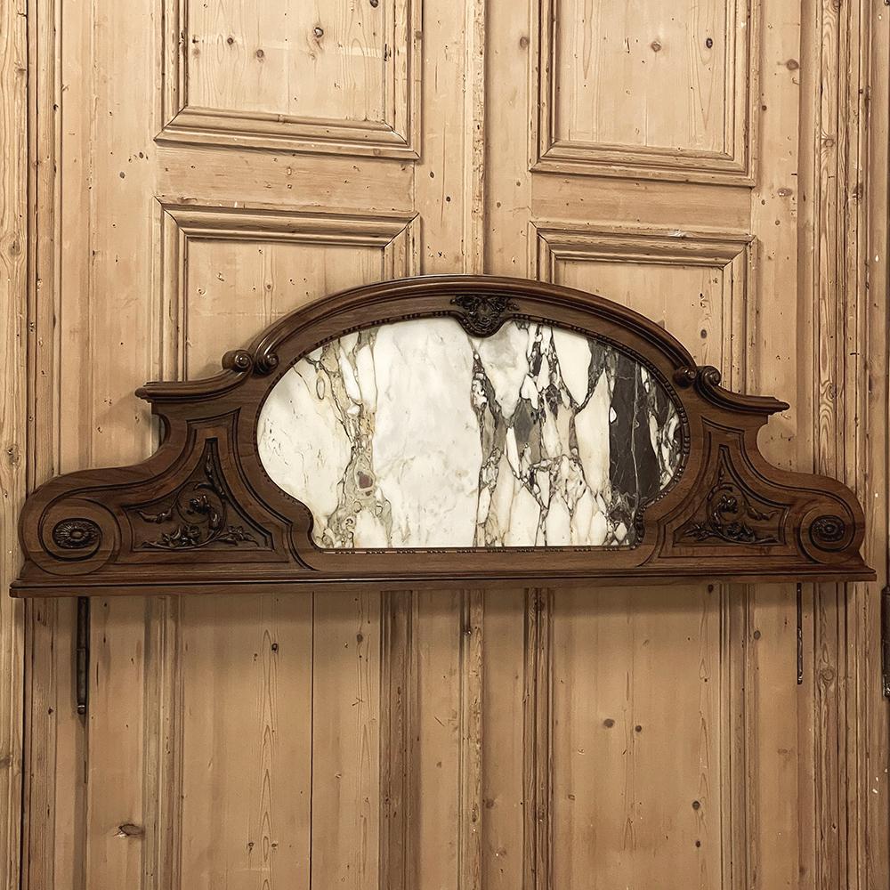 Antique French Louis XIV Carved Walnut Wall Decoration with Marble Inset will make a splendid accent piece, especially over the mantel, a cased opening, or over a large doorway or window.  Sculpted from sumptuous French walnut, it features a boldly