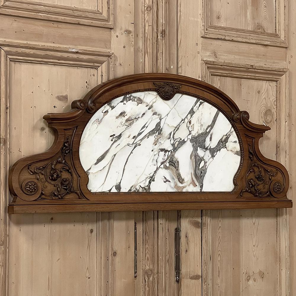 Antique French Louis XIV Carved Walnut Wall Decoration with Marble Inset will make a splendid accent piece, especially over the mantel, a cased opening, or over a large doorway or window.  Sculpted from sumptuous French walnut, it features a boldly