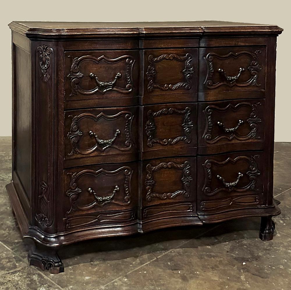 Antique French Louis XIV Commode ~ Chest of Drawers was fashioned from select oak, and designed with an arbalette facade which, when viewed from above, resembles the shape of an archer's bow.  The top is contoured and beveled to follow the luxurious