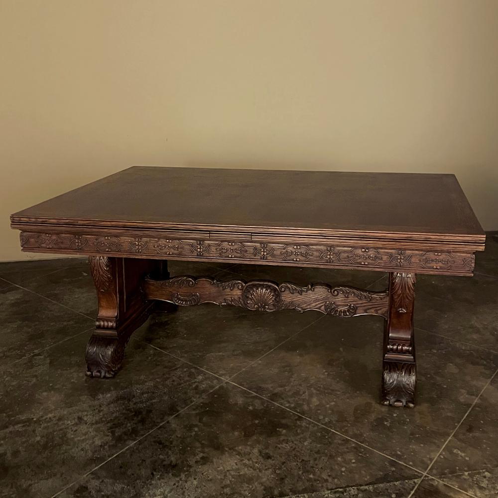 Antique French Louis XIV Draw Leaf Banquet Table combines timeless styling with incredible versatility to create the perfect dining table! When closed, it is just under six feet in length, but with both leaves drawn out it extends to over eleven