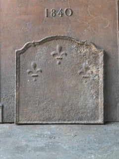 Plaque de cheminée française ancienne Louis XIV « Fleur de Lys », 17ème siècle