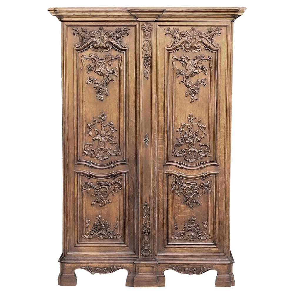 Antique French Louis XIV Petit Armoire, Bonnetiere is an unusual piece, for sure! Only five and a half feet tall, it's plenty deep enough to provide copious storage, and with intriguing double-set hinges it allows one to open the doors out 270