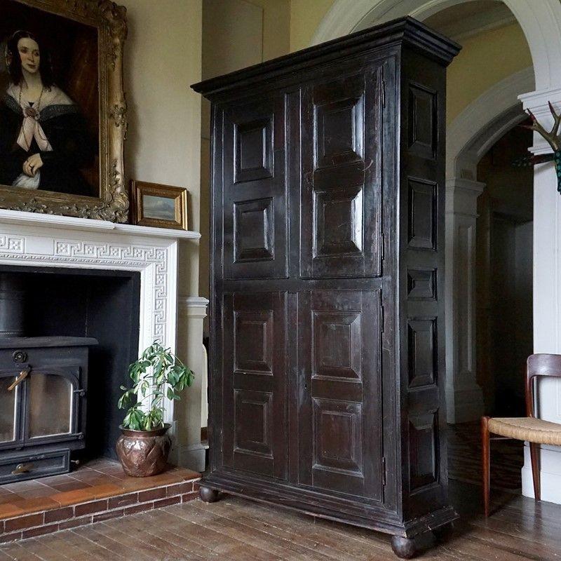 Large Antique Panelled Country House Housekeepers cabinet

A country made piece, made of chestnut in a rustic, slightly irregular manner with simple panelled doors and sides which create an elegant silhouette that would fit in either a traditional
