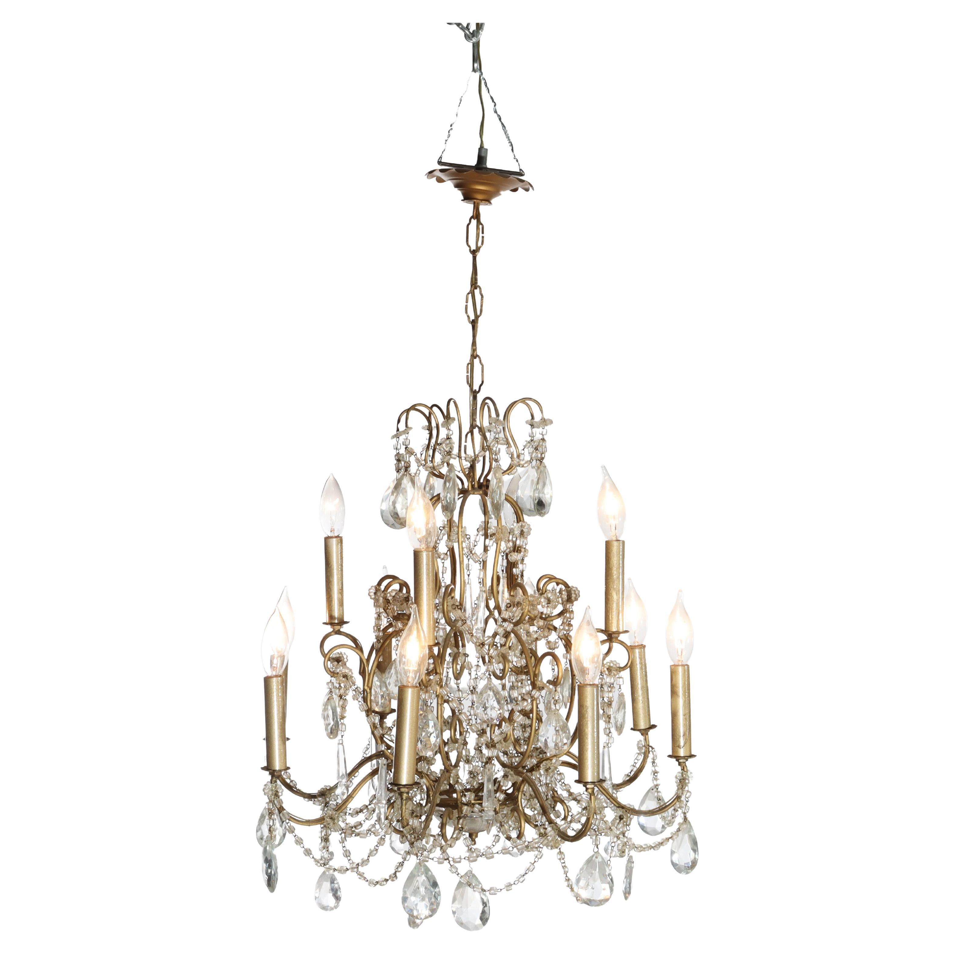 Antique French Louis XIV Style Brass 
Crystal 12-Light Teired Chandelier c1930 For Sale