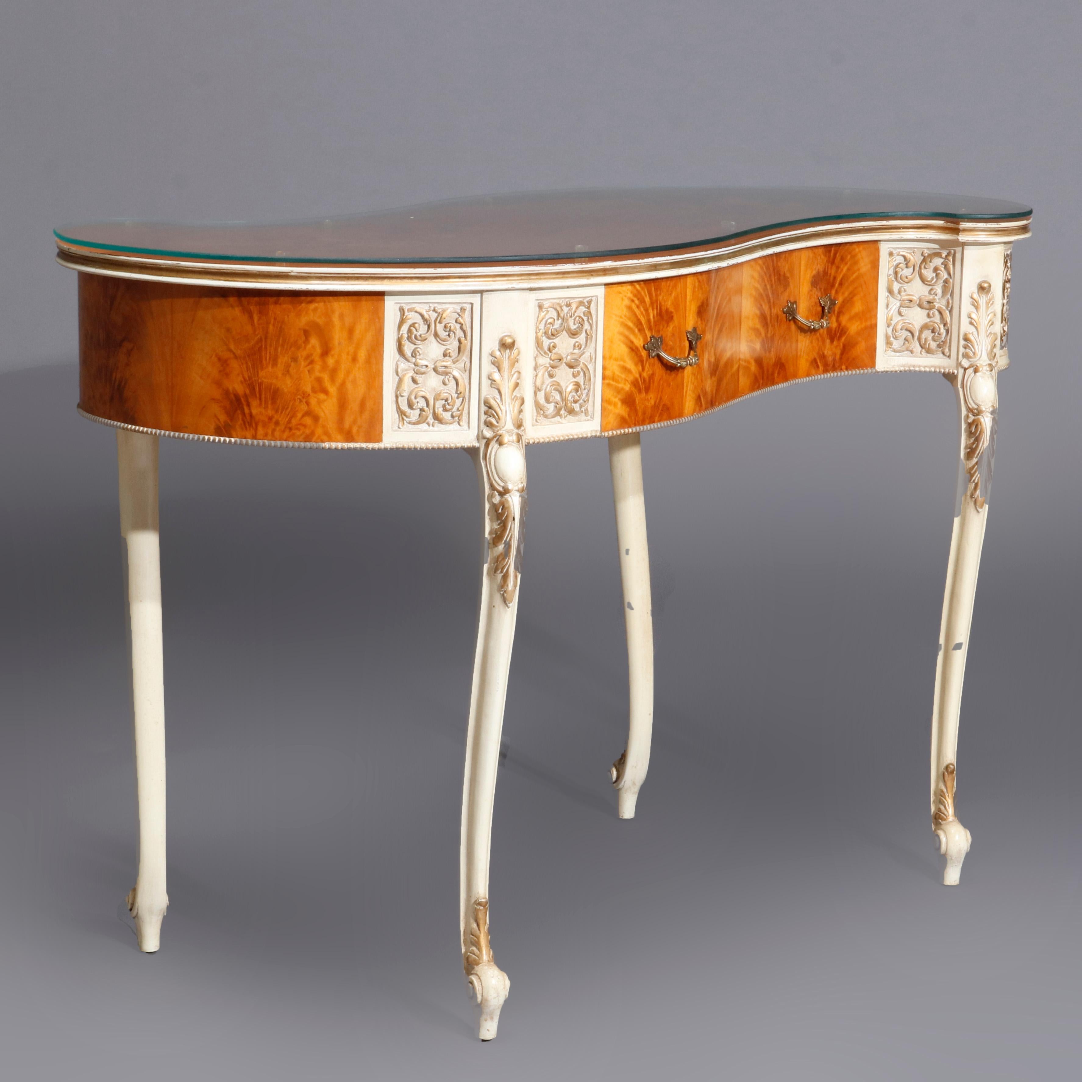 An antique French Louis XIV style ladies desk offers kidney form with satinwood marquetry case having floral inlaid writing surface with crossbanded framing, single drawer and painted elements having gilt scroll decoration, raised on cabriole legs