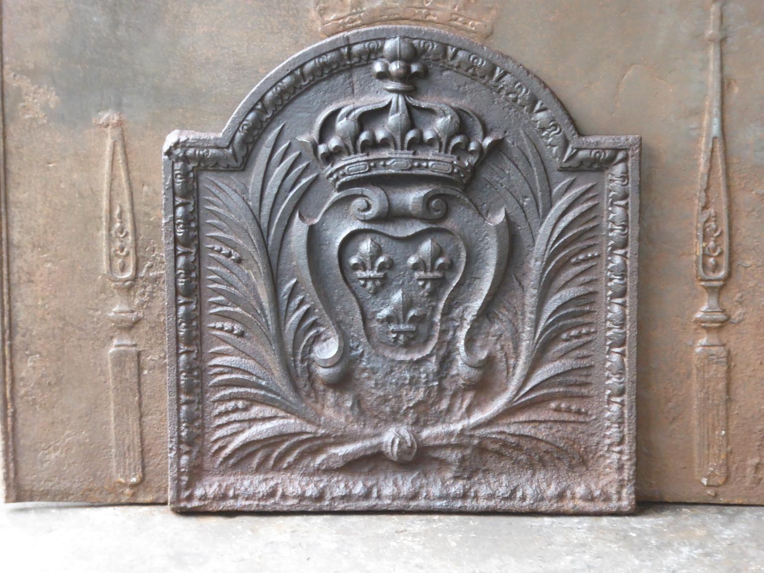 18th century French Louis XV fireback with the arms of France. Coat of arms of the House of Bourbon, an originally French royal house that became a major dynasty in Europe. It delivered kings for Spain (Navarra), France, both Sicilies and Parma.