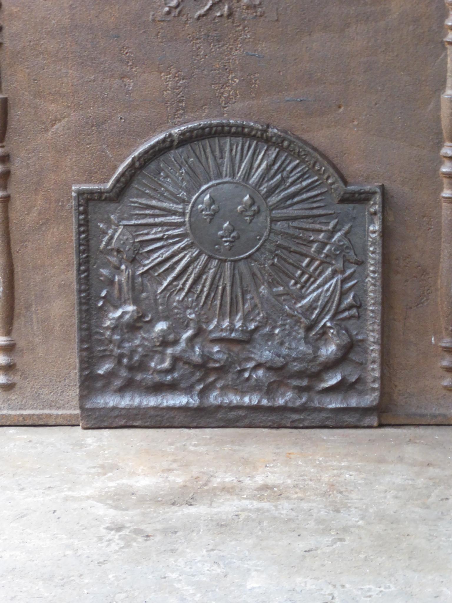 18th century French Louis XV fireback with a version of the arms of France. 

The fireback is made of cast iron and has a natural brown patina. Upon request it can be made black / pewter. It is in a good condition and does not have cracks.







