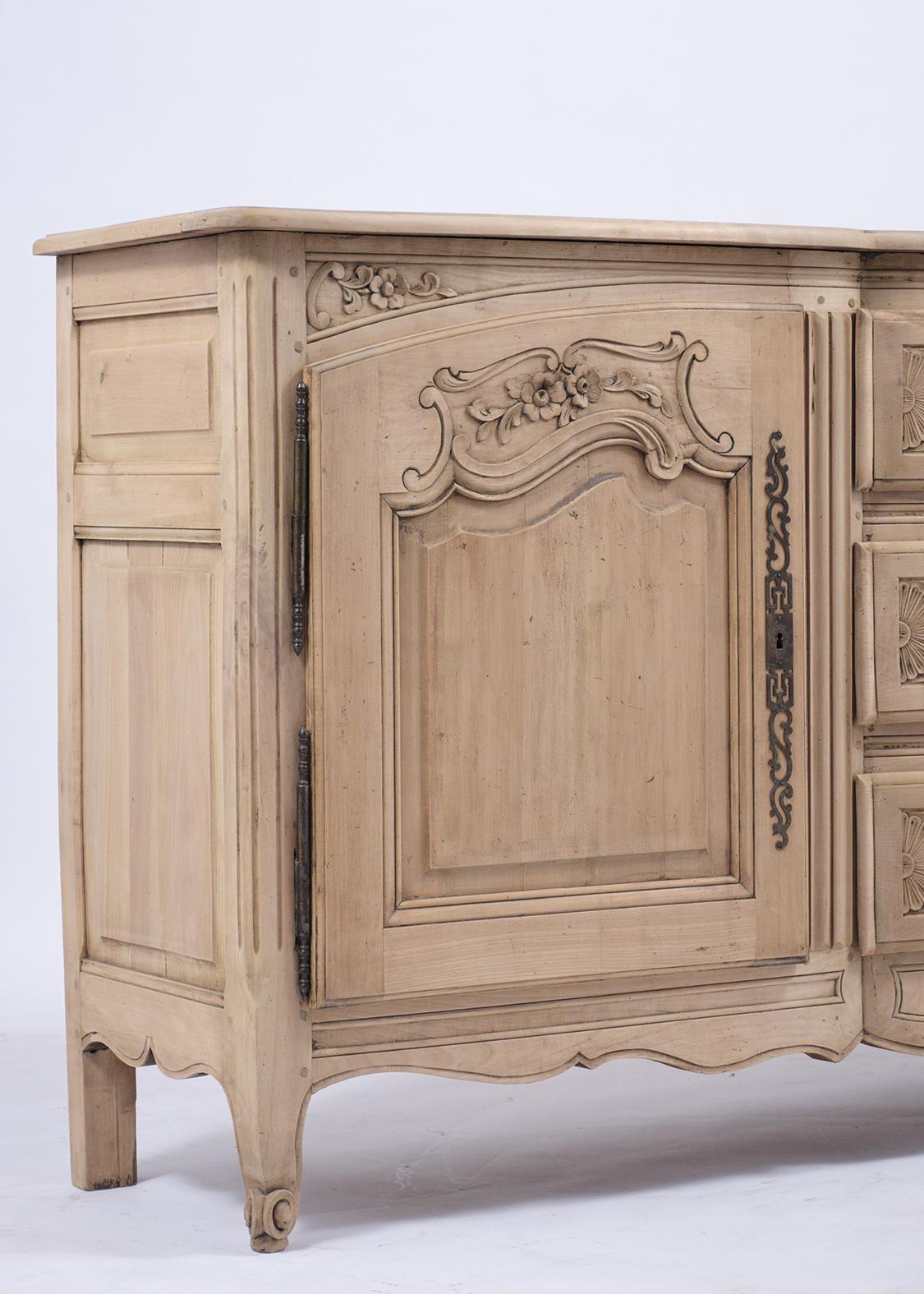 French 19th Century Louis XV Walnut Buffet with Hand-Carved Details and Iron Accents