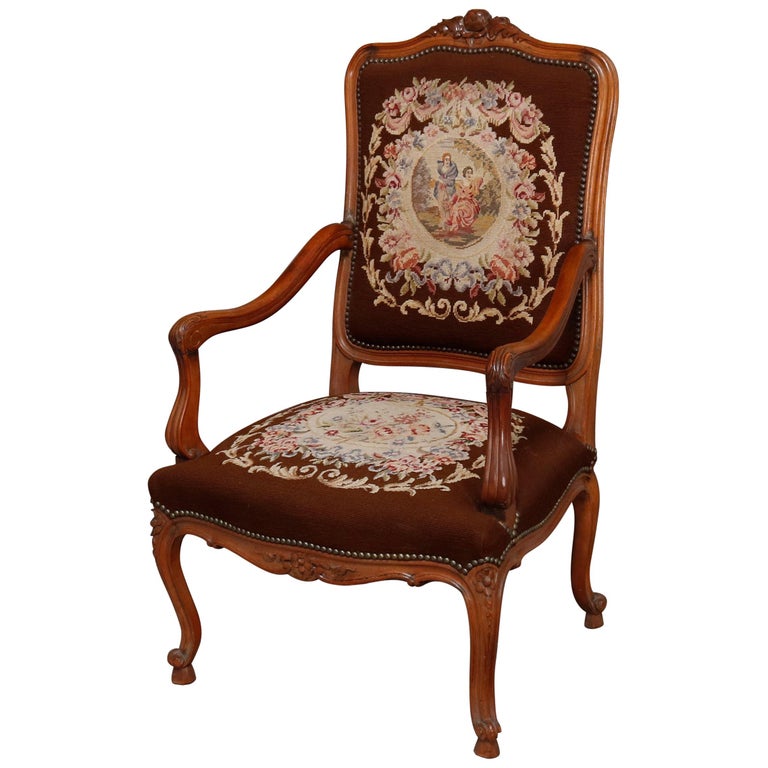 Louis XV style French arm chair with hoof foot in fruit wood.