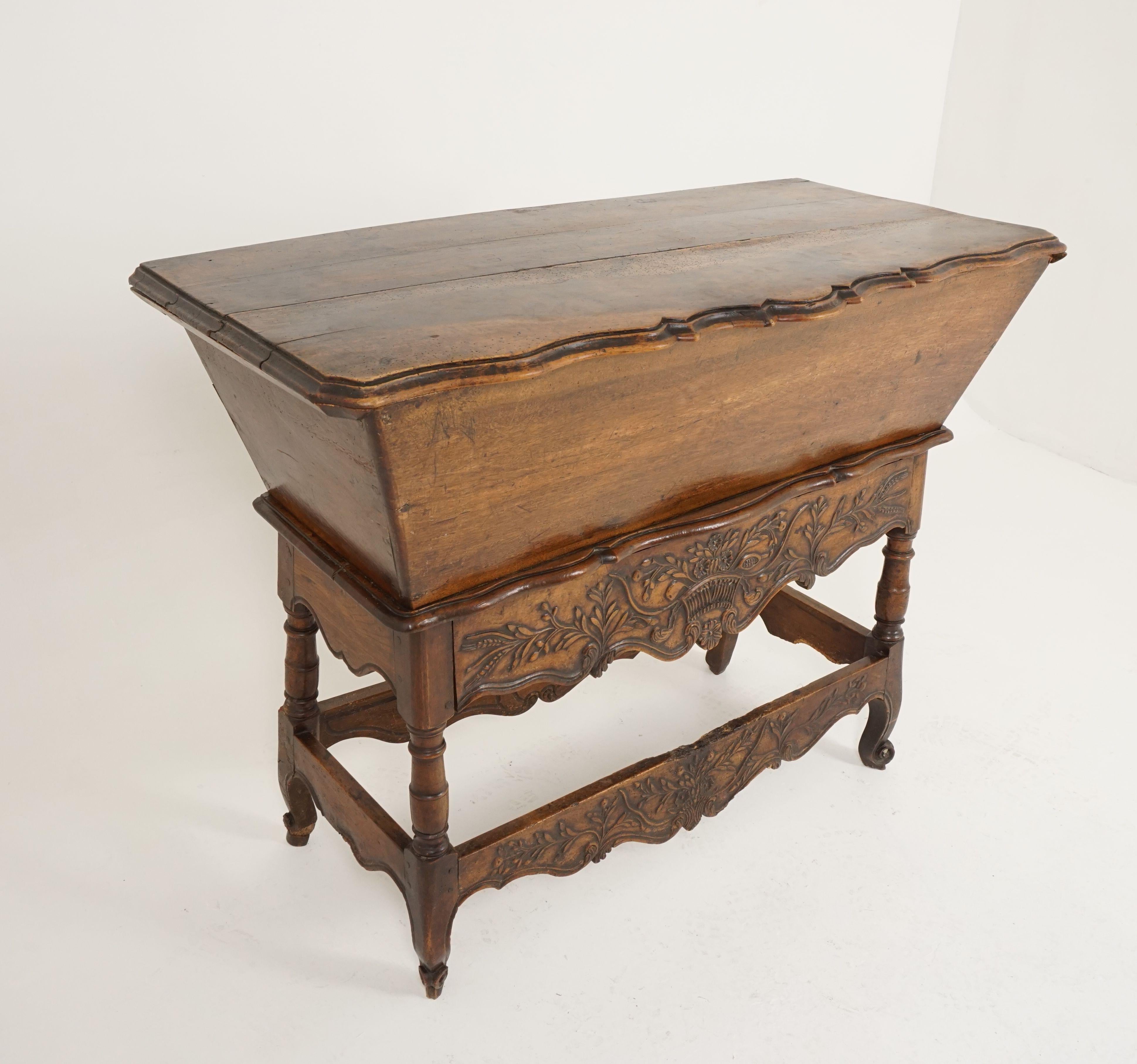 Antique French Louis XV carved walnut dough box, France, 1880, H196

France, 1880
Solid walnut
Original finish
Three board scalloped lift up lid
Opens to reveal large storage compartment
Beautifully carved drawer with foliage design underneath
All