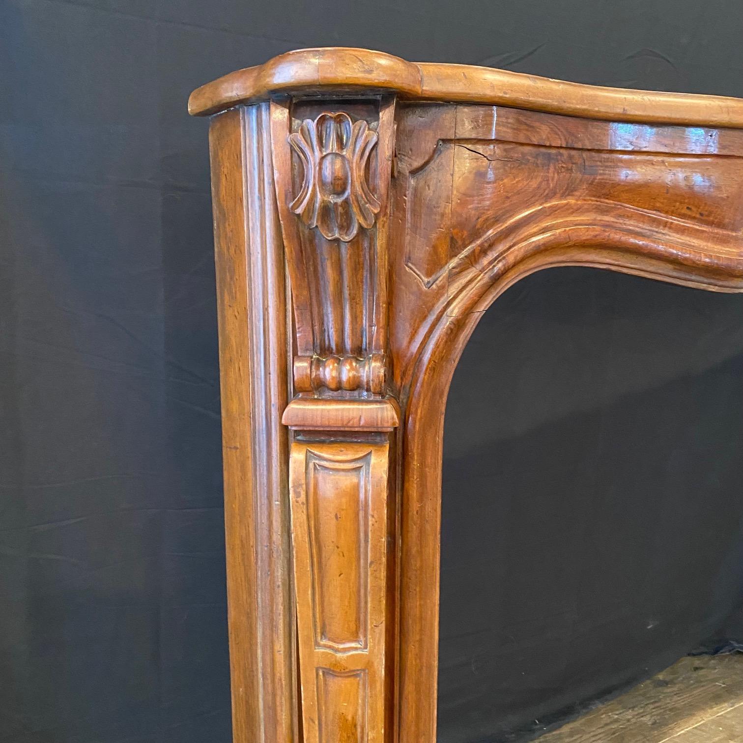 Antique French Louis XV Carved Walnut Fireplace Mantel In Good Condition In Hopewell, NJ