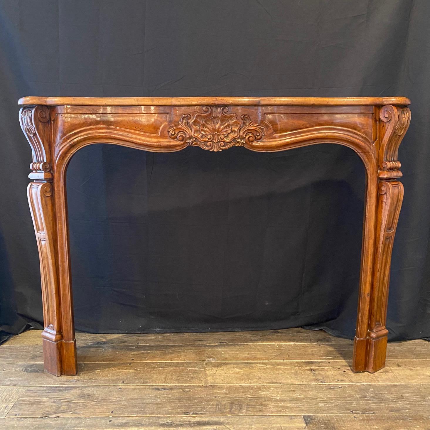 19th Century Antique French Louis XV Carved Walnut Fireplace Mantel