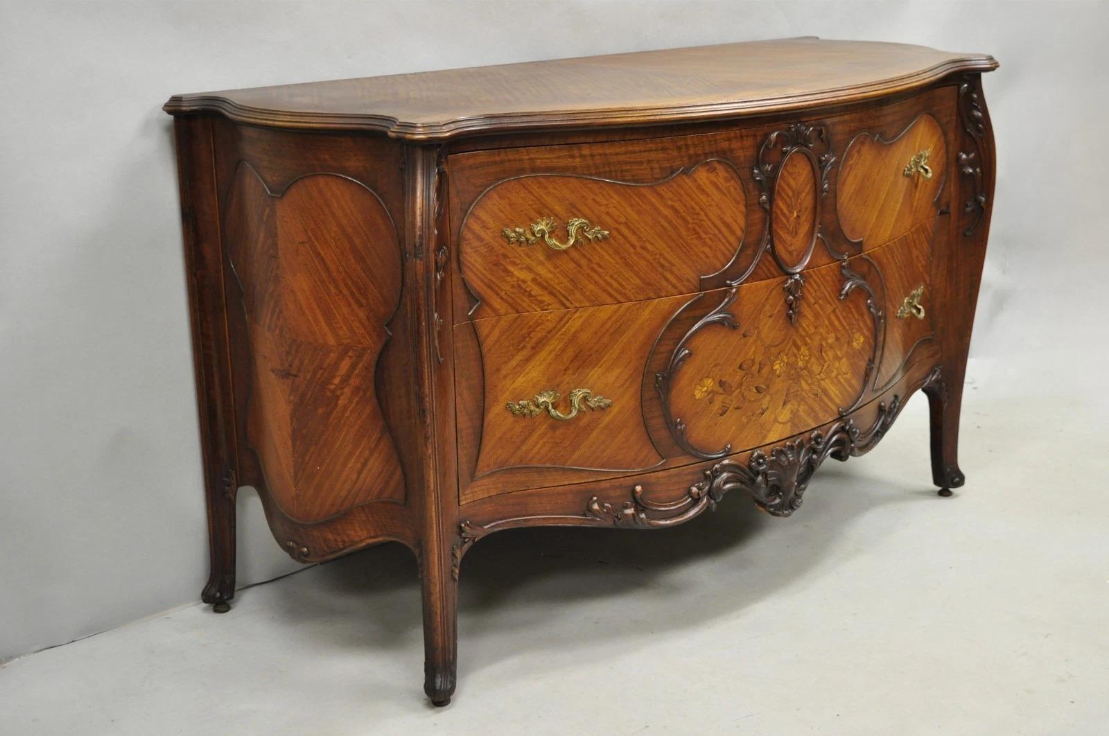 Please message us with your zip code to request a more reasonable domestic U.S. shipping quote.

Antique French Louis XV Style Carved Walnut Floral Inlay Bombe Demilune Commode Dresser. Item features a serpentine form, carved scrollwork throughout,