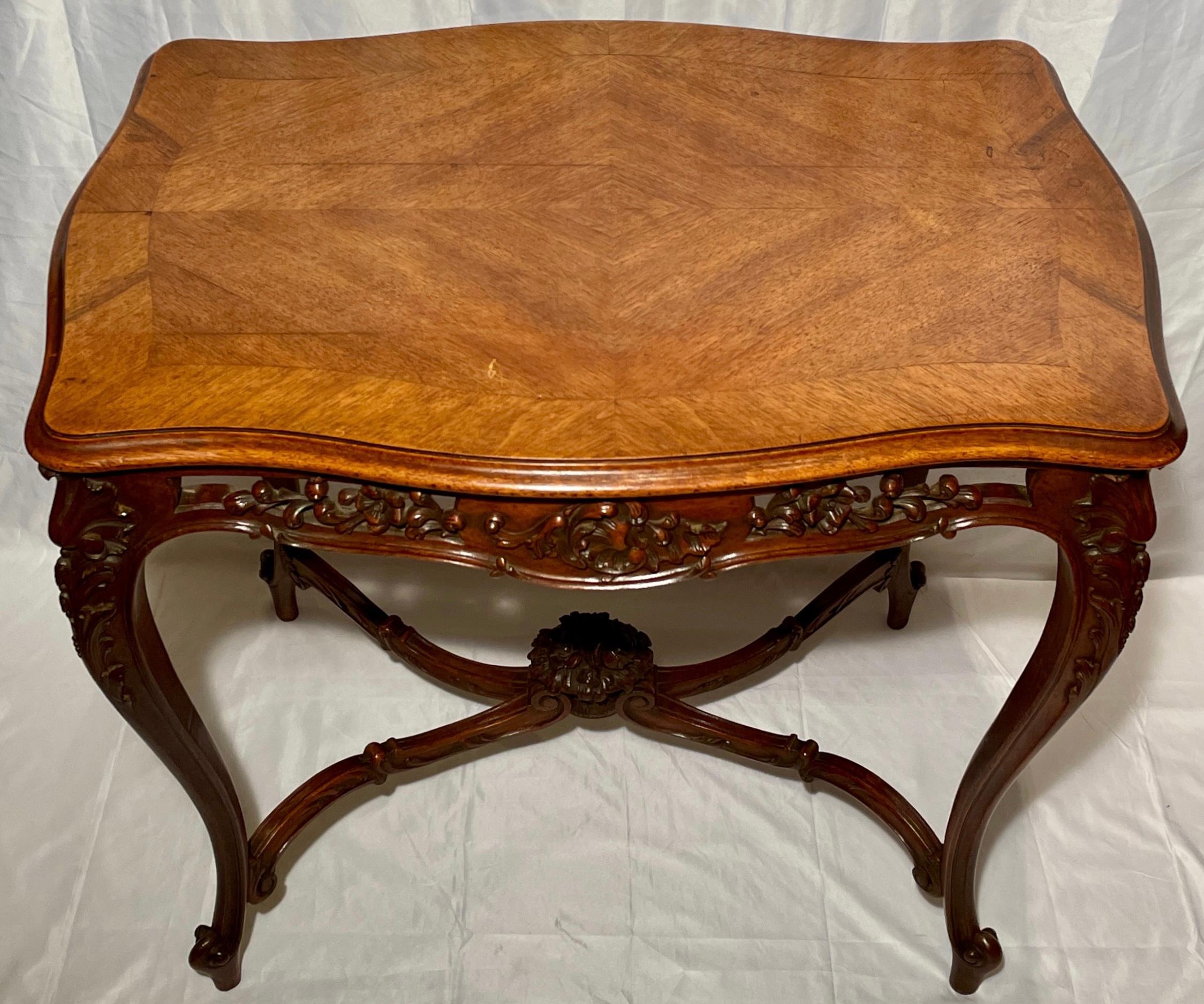 Antique French Louis XV carved walnut table, circa 1890.