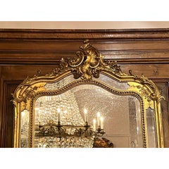 Antique French Louis XV Carved Wood and Gold Leaf Mirror, circa 1890.