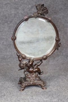 Antique French Louis XV Clodion Style Bronze Desk Mirror With a Cherub