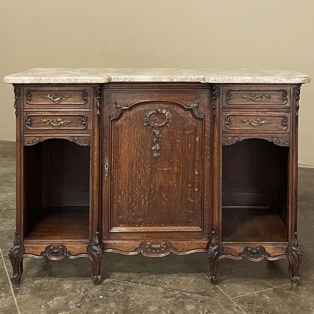 Antique French Louis XV Display Buffet with Travertine was designed in what we call a relaxed formal affair, with a step-back center section flanked by an open display niche topped with two drawers on each side, both slightly stepped forward to