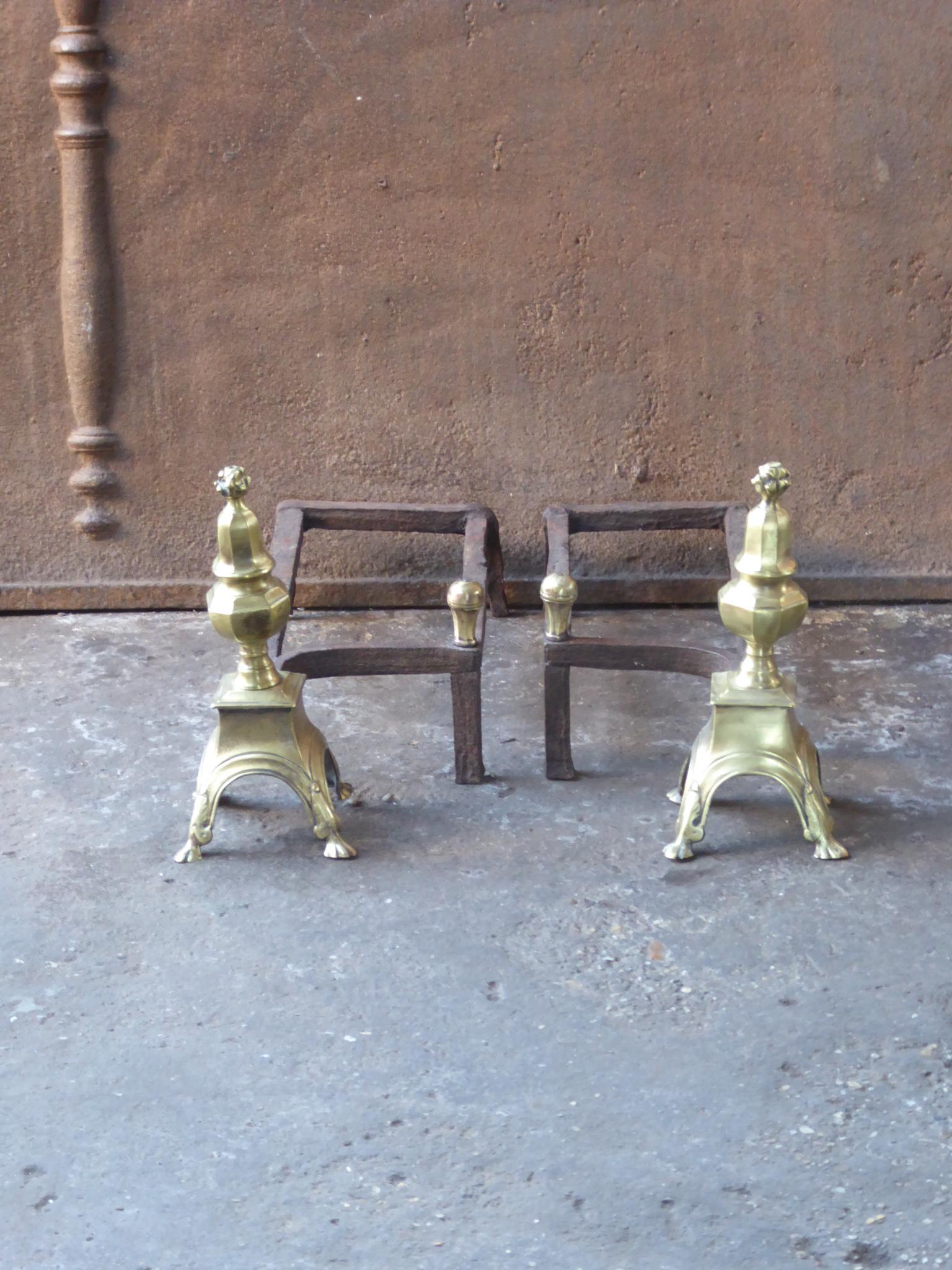 18th Century French Louis XV fireplace basket. The fire basket is made of brass and wrought iron. The basket is in a good condition and is fully functional.