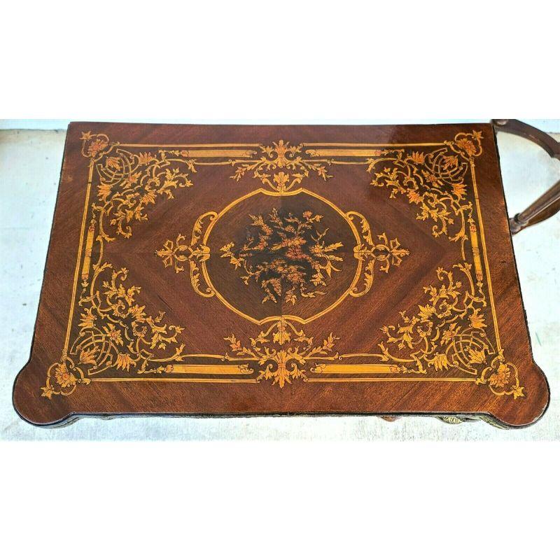 Offering One Of Our Recent Palm Beach Estate Fine Furniture Acquisitions Of A
Antique French Louis XV Revival Flip Top Game card table with bronze Ormolu mounts

With inlaid marquetry designs and a leather top with gilt trim.

Approximate