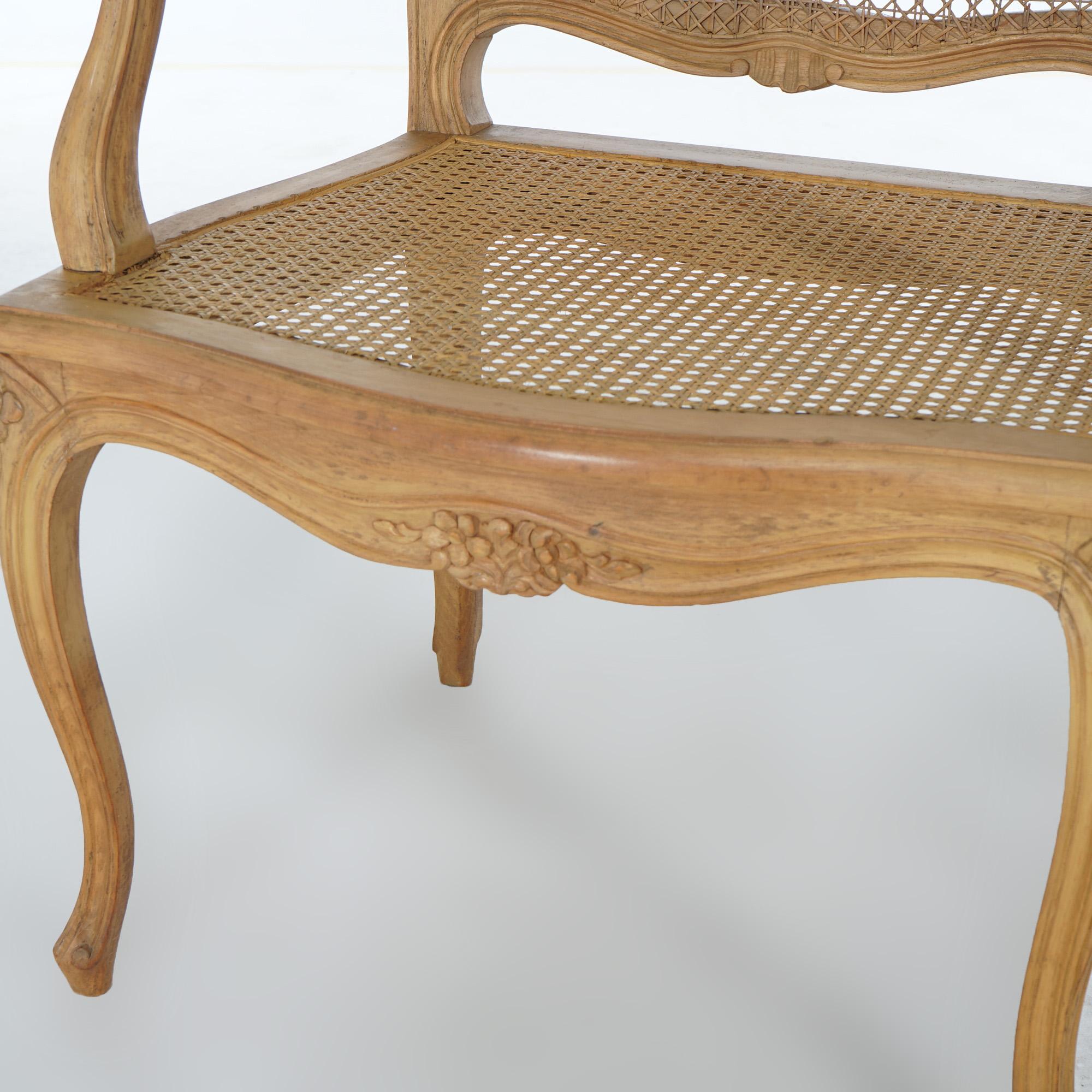 Carved Antique French Louis XV Fruitwood & Cane Arm Chair Circa 1900 For Sale