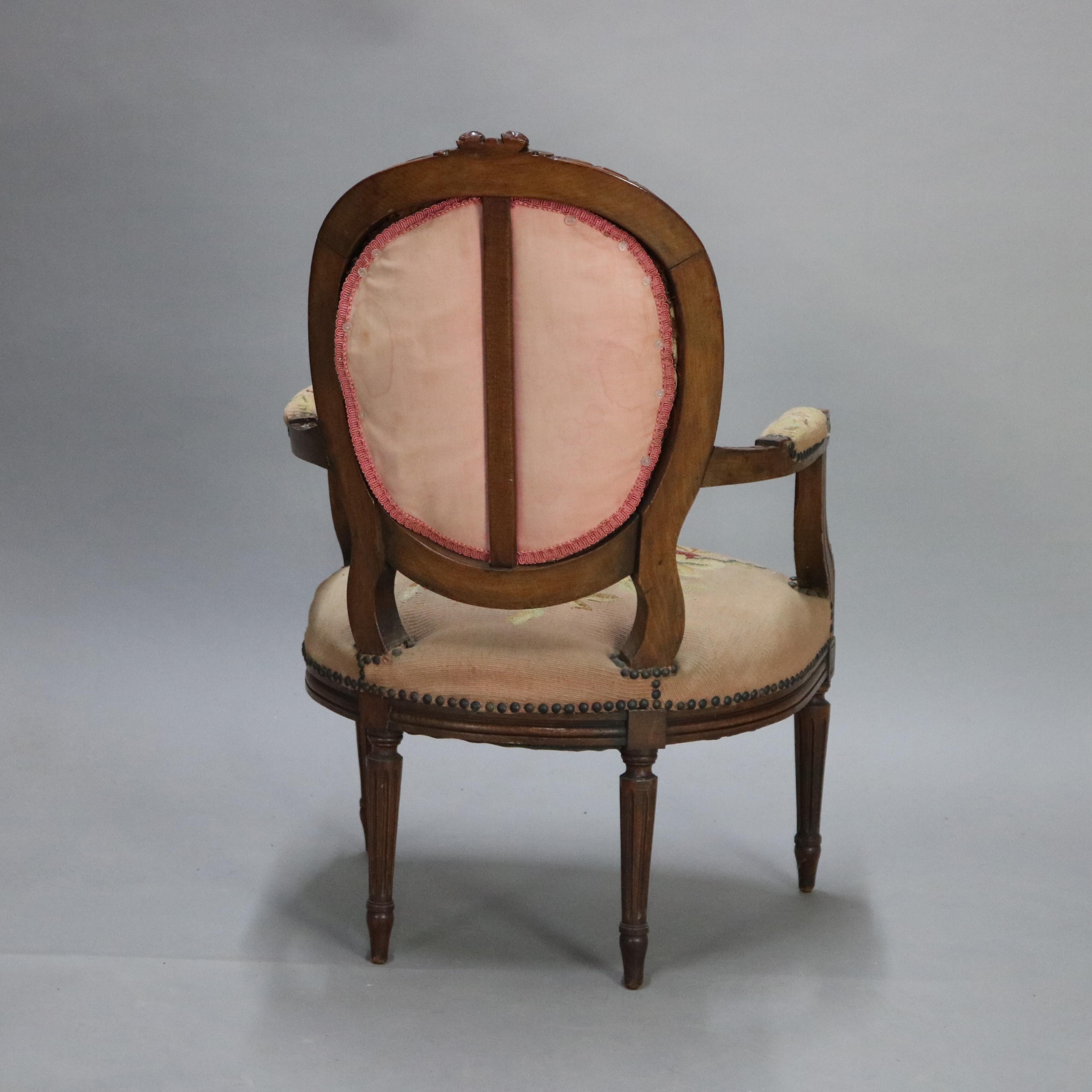 Carved Antique French Louis XV Fruitwood and Needlepoint Armchair, 19th Century