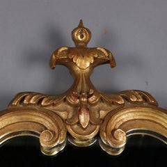 Antique French Louis XV Giltwood Shield Form Scroll and Foliate Wall Mirror